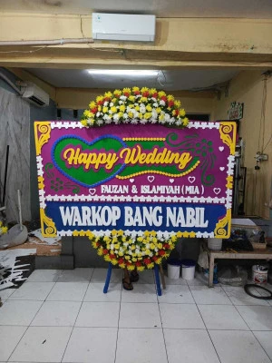 Papan Bunga di Malaka Sari